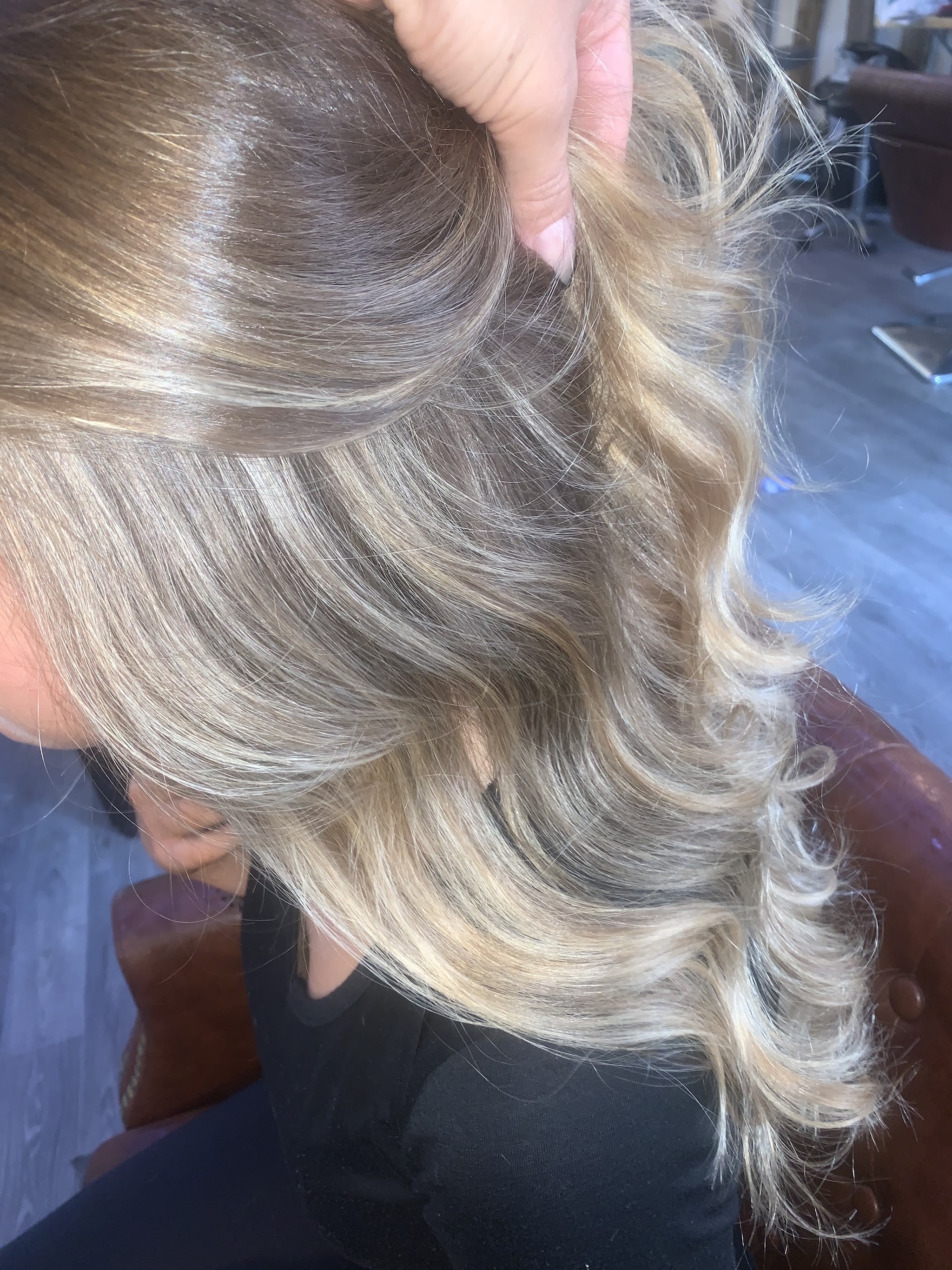 Blonde highlights lifted by hand to show the colour through the lengths